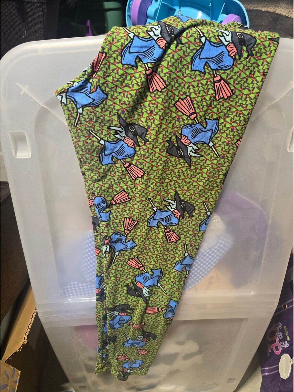 LuLaRoe Leggings with Colorful Flying Witch Pattern on Green Background